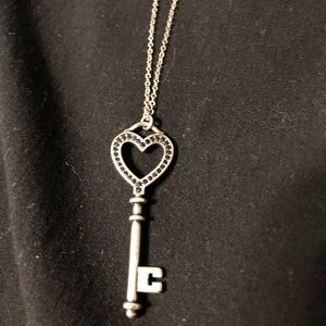 Long necklace with heart shaped key